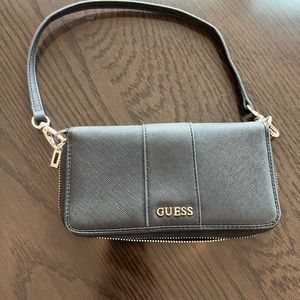 Guess wallet with strap. Black with gold tone hardware.